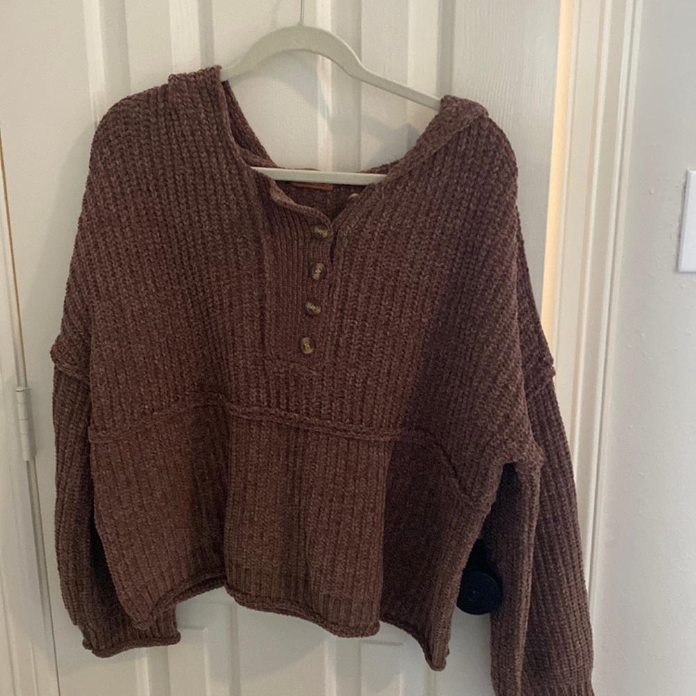 Brown sweater.